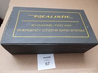 Black box labeled 'Realistic 40 Channel Two Way Emergency Citizens Band System'