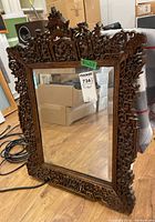 Front view of full mirror showing frame and beveled glass