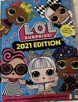 Front cover of L.O.L. Surprise 2021 Edition book showing four different illustrated dolls with colorful outfits and accessories, and promotional text for activities and extra content.
