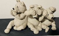 Three stone bear figurines posed as see no evil, hear no evil, speak no evil, made by Second Nature Design Quarry Critters collection.