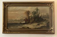 Frontal view of antique framed oil painting showing landscape with trees, water, and mountains.