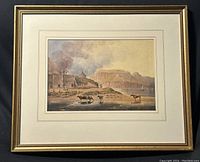Frontal view of framed watercolor landscape painting, entire artwork visible