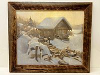 Framed oil on canvas showing a snowy rustic cabin scene with a wooden fence in the foreground