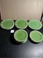 Full view of all plates in two sizes showing embossed rim design.