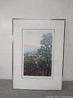 Framed serigraph showing full artwork and frame.