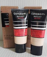 Four tubes of CoverGirl Outlast Active 24 Hour Foundation SPF 20, shade 800 Fair/Ivory, front view with two cardboard boxes.