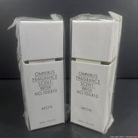Two new Omnibus fragrance diffusers by MON. with scent 'Brisk' 30ml boxed and shrink-wrapped together.