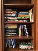 Bookshelf with close-up of fiction books by Jonathan and Faye Kellerman and related mystery novels.