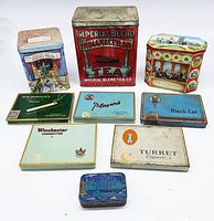 Top view of the collection showing all 9 decorative vintage tins with various branding and artwork.