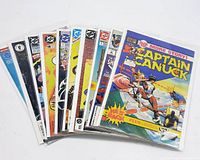 Lot of ten comic books fanned out showing front covers, with Captain Canuck comic prominently visible.