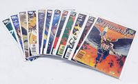 Photo of 12 Hawkman comic books fanned out showing front covers and bagged and boarded condition