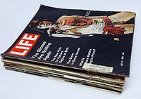 Stack of vintage LIFE magazines including cover with The Rolling Stones in concert