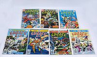 Seven vintage Karate Kid comic books, all individually bagged and boarded, with colorful illustrated covers portraying martial arts action scenes.
