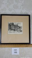 Front view of framed etching showing overall condition and framing.