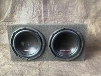 Front view of black enclosure with two large subwoofer speakers with Bass Inferno logos