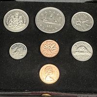 Top view of entire 1977 Canadian coin set in black velvet-lined display box showing 6 coins.