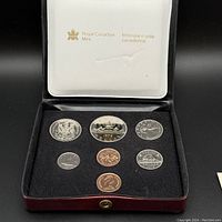 Set of Canadian coins in original presentation display box with Royal Canadian Mint logo.