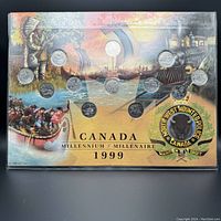Full view of the 12 Canadian Millennium quarters mounted on a decorated protective board with artwork depicting Canadian history and culture.