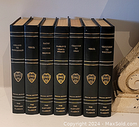Full set of 8 Harvard Classics Deluxe Edition books grouped together showing spine titles and condition.
