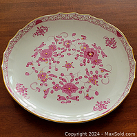 Top view of the large Meissen porcelain bowl showing the pink floral painted design and gold trimmed scalloped edge.
