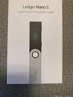 Front of Ledger Nano S box displaying the device image and branding.