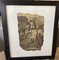 Full view of framed Judaica papyrus print under glass, showing the complete artwork and frame.