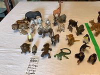 Tabletop overview of animal figurine assortment