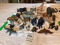 Overall view of all figurines on white table