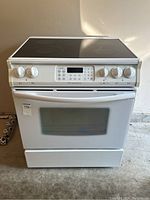 Front view of range showing control panel, oven door and storage drawer