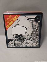 Closed box set of vinyl LPs featuring Jo Jo Zep & The Falcons Screaming Targets album cover with pilot helmet illustration.