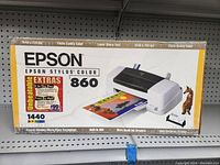 Epson Stylus Color 860 printer box with image and features listed on front, including 1440 dpi, Photo quality color, built-in USB.