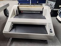 Front view of the GBC Velobind System3 Pro binding machine showing the machine body and binding slot with label.