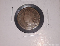 Obverse side showing Liberty with feathered headdress and date 1890 in lower grade worn condition.