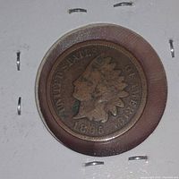 Obverse side of 1894 Indian Head Penny showing Liberty head and date.
