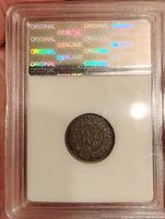 Back side of the 1903 Indian Head Penny showing the denomination and wreath inside the original certification slab with genuine authenticity hologram