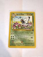 Front of Butterfree card displaying holographic artwork and game stats