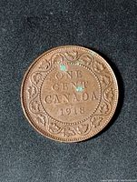 Reverse displaying denomination, country, date and maple leaf wreath.