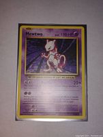 Front view of the Mewtwo Pokemon trading card showing character and stats clearly.