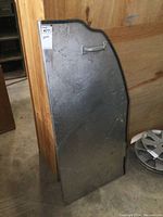 Aluminum shelf panel, showing front view with mounted handle, dimensions labeled as 52x23 inches, surface shows typical wear and scuffs.