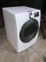 Front-left perspective view of dryer showing overall cabinet and door