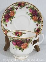 Front view of the Royal Albert Old Country Roses cup and saucer set showing floral pattern and gold trim.