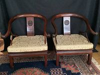 Front view of both hardwood chairs with cushions