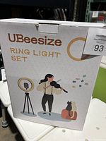 Closed box showing UBeesize Ring Light Set with graphic of ring light and tripod on front