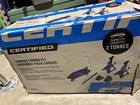 Box of Certified Garage Combo Kit showing product name, capacity, and included items.