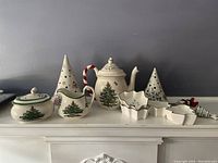 Full view of the Christmas tabletop set showing all items including teapot, creamer, sugar bowl, condiment dishes and Villeroy & Boch tree tea lights