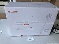 Retail packaging box showing brand name, product name and outline image of the vacuum