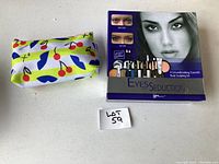 Photo of Eyes of Seduction eye makeup kit by IT Cosmetics with Clinique makeup bag