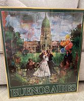 Full view of gold framed print showing colorful Buenos Aires scene with architectural and festive elements.