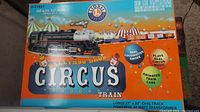 Front of set box showing locomotive and circus train illustration
