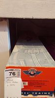Box end panel showing Lionel Celebration Series logo, model info label, lot tag